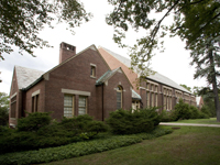 a large brick house for the center of autism and the developing brain